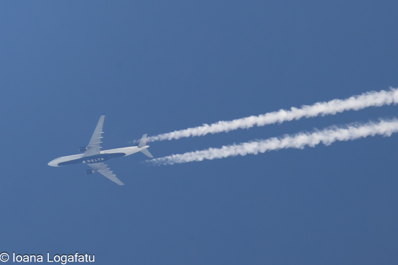 Majestic airplane gliding through a clear blue sky
